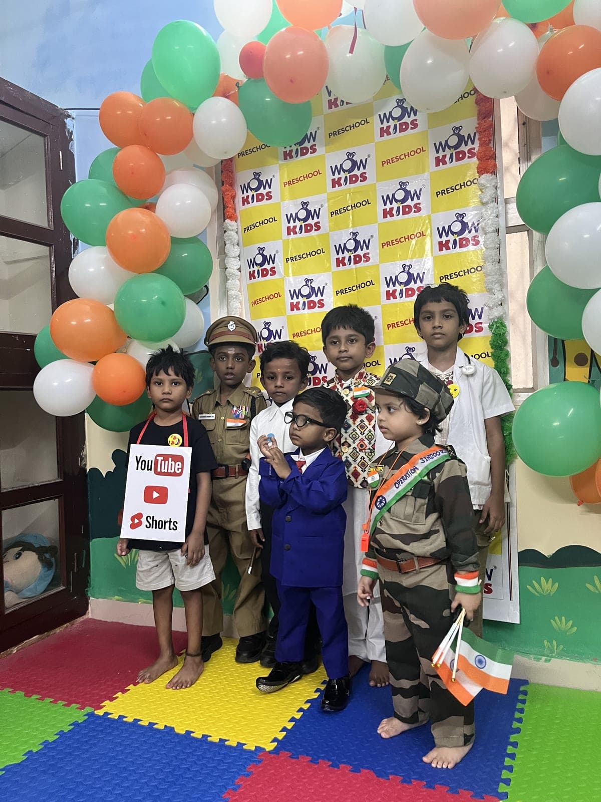 Preschoolers dressed as a police officer, army officer, doctor and YouTuber for the Independence Day fancy-dress celebration